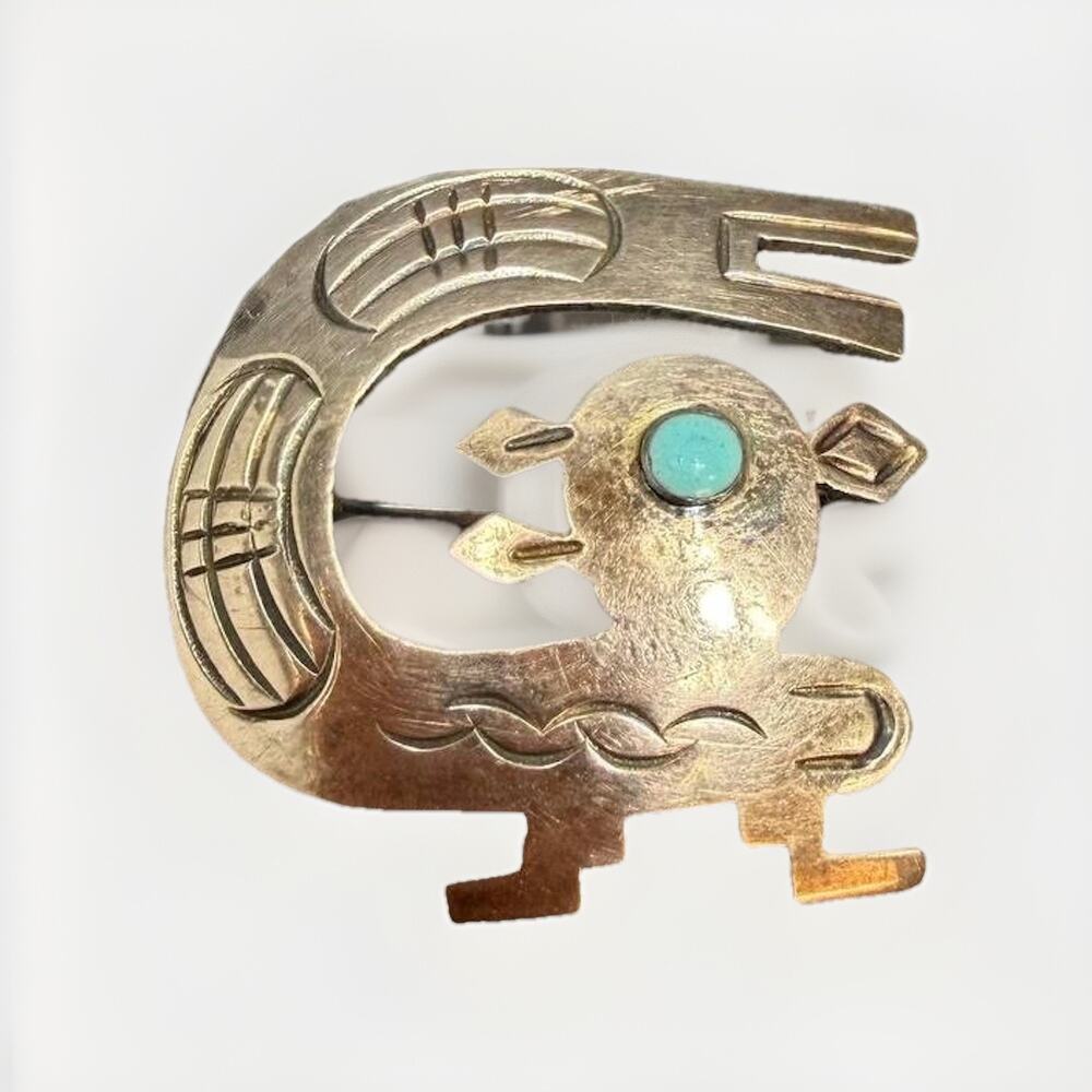 Vintage Peruvian sterling silver pendant featuring a detailed Andean / Pre-Colum